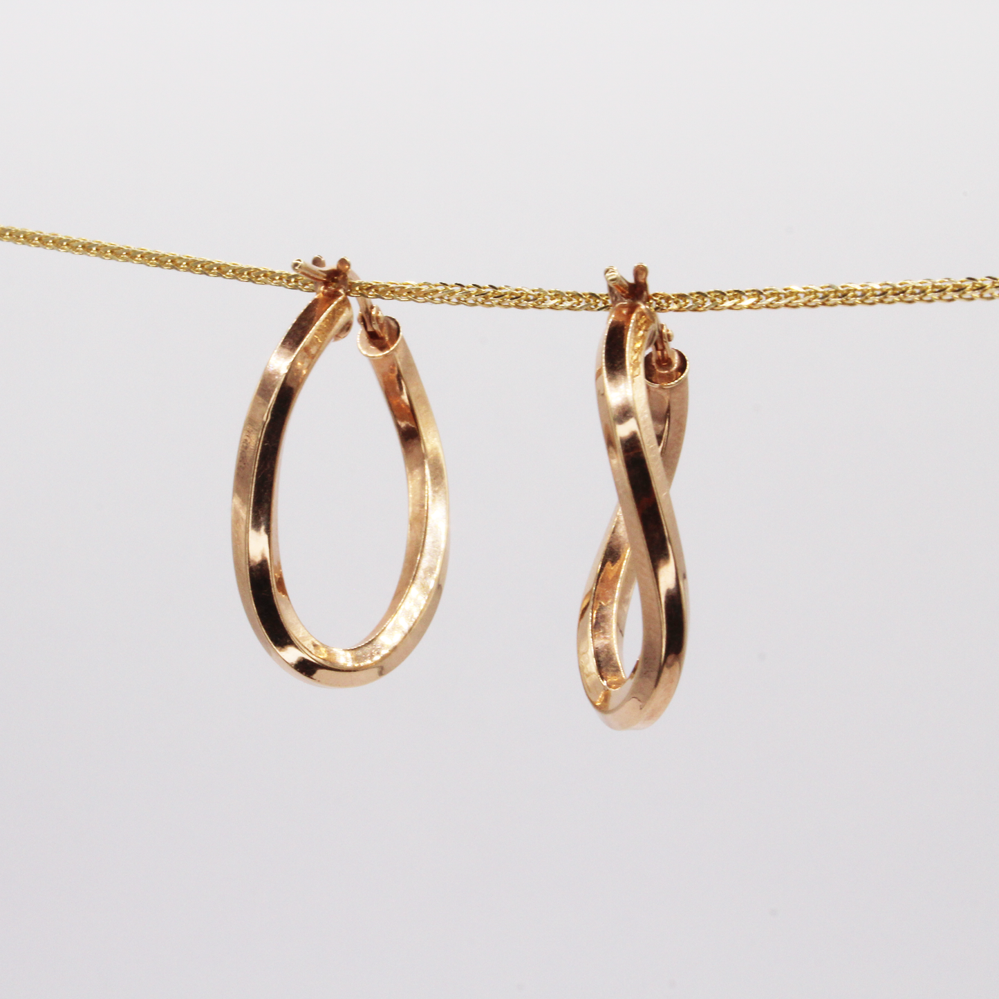 Curved Rose Gold Hoops